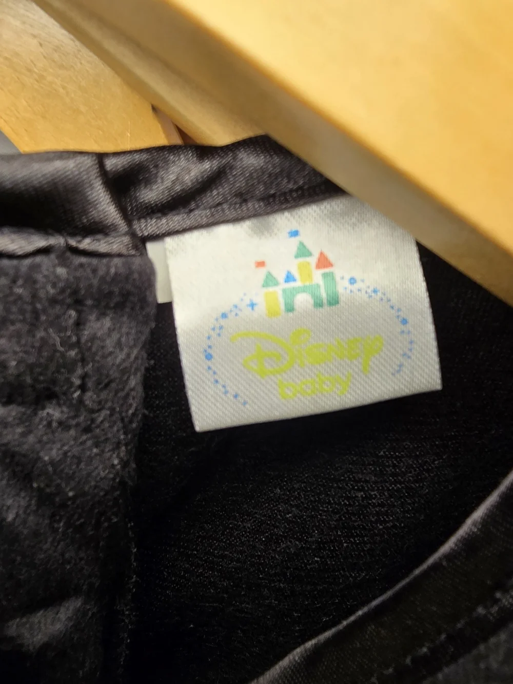 Disney Baby Mickey Costume Black Tunic with Yellow and Green Label Accents.